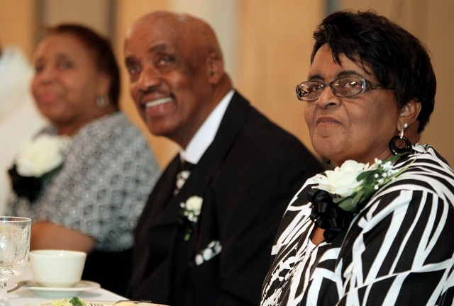 Mary Alice, Jerry and Winnie listen to the Family Tree presentation