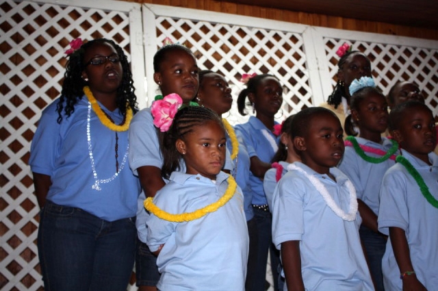 Children of the family singing